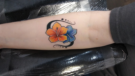 Explore book lovers tattoo ideas, creative tattoo ideas in Denison, available at Calypso Tattoo