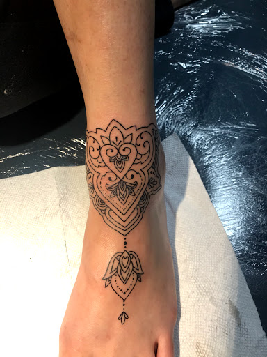 Tattoo Shop «BioGraphix Tattoo Studio», reviews and photos, 147 W Manlius St, East Syracuse, NY 13057, USA