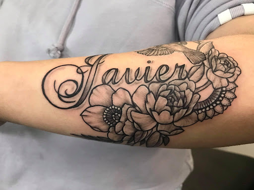 Explore skier tattoo ideas, creative tattoo ideas in Harrah, available at Gypsy Blood Body Art Studio