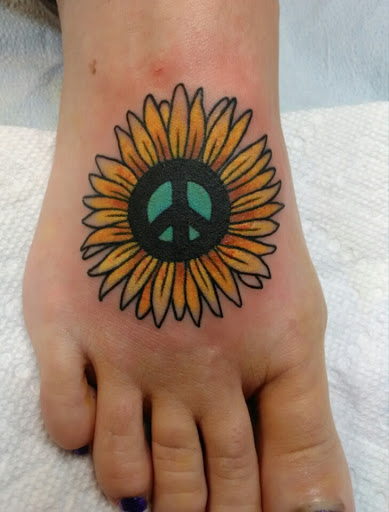 Explore western sleeve tattoo ideas, creative tattoo ideas in Little Rock, available at Seventh Street Tattoos & Piercing