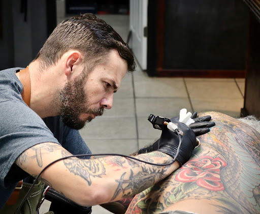 Explore gastric sleeve tattoo ideas, creative tattoo ideas in Tampa, available at HAWKS ELECTRIC TATTOOS