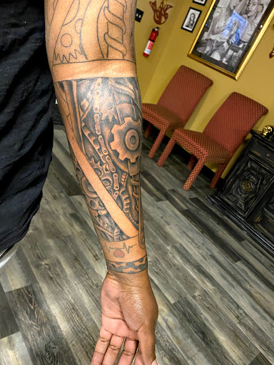 Explore lower back tattoo cover up ideas, creative tattoo ideas in Warner Robins, available at Untold Pain Tattoo Studio