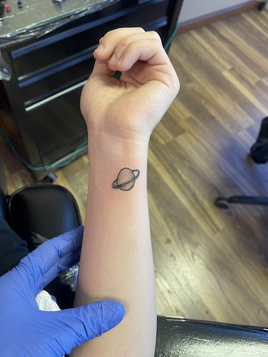 Find tattoo ideas for in between breast for your next unique tattoo in Albuquerque at Albuquerque Ink tattoo College Plaza