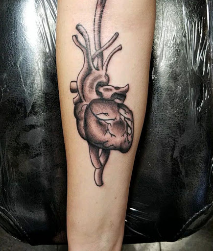 Explore tattoo name ideas on arm, creative tattoo ideas in Lagrangeville, available at Black Cherry Tattoo Studio NY