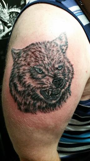 Explore bison tattoo ideas, creative tattoo ideas in Erie, available at EliKingInk