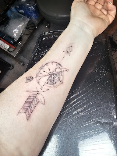 Explore middle neck tattoo ideas, creative tattoo ideas in New Orleans, available at Catahoula Tattoo 