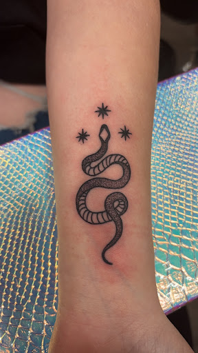 Explore large thigh tattoo ideas, creative tattoo ideas in Loveland, available at Satori Tattoo