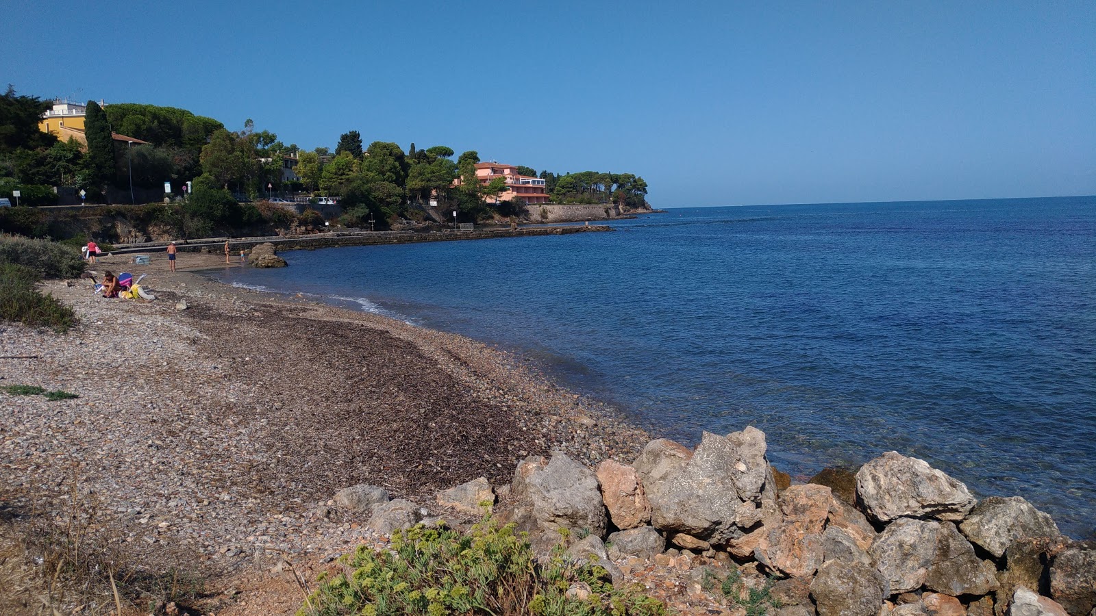Foto van Spiaggia di St.Liberata met recht en lang
