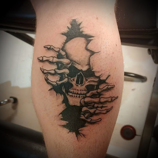 Explore leg tattoos ideas for men, creative tattoo ideas in Lewes, available at Ancient Art Tattoo & Piercing Studio