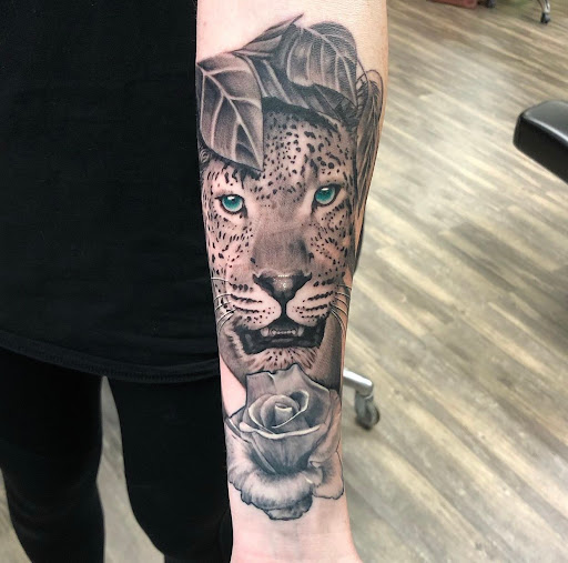 Explore michigan wolverines tattoo ideas, creative tattoo ideas in Campbellsville, available at Green River Tattoo Company