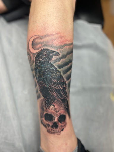 Find small tree tattoo ideas for your next unique tattoo in Asheville at Unification Tattoo