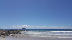 Foto av Circuit Beach omgiven av berg