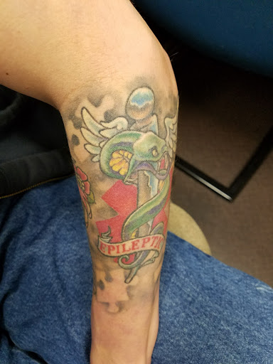 Find angel tattoo ideas for ladies for your next unique tattoo in Owensboro at Lady Luck Tattoo and Body Piercing