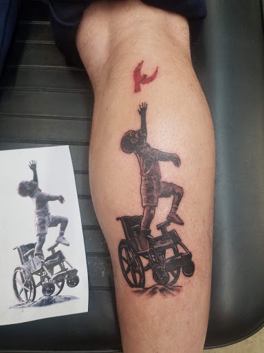 Tattoo Shop «Grapes Designs», reviews and photos, 103 S 3rd St, Scottsville, KY 42164, USA