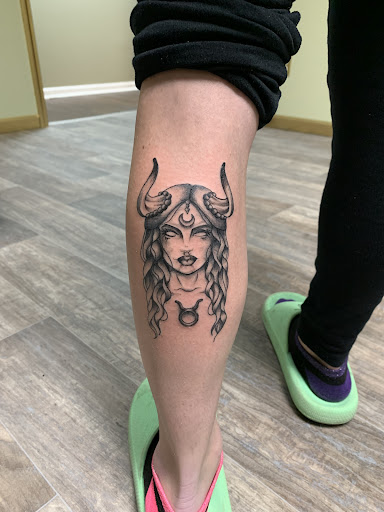 Explore lilac tattoo ideas, creative tattoo ideas in Kirksville, available at Bedford Legacy Tattoo and Body Piercing