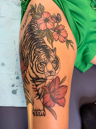 Explore face tattoos for men ideas, creative tattoo ideas in Fall River, available at Indelible Ink Tattoo Studio 2.0