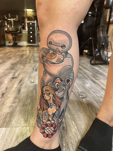 Explore snake tattoo ideas for females, creative tattoo ideas in Leesville, available at Revolution Ink Tattoo and Art Gallery