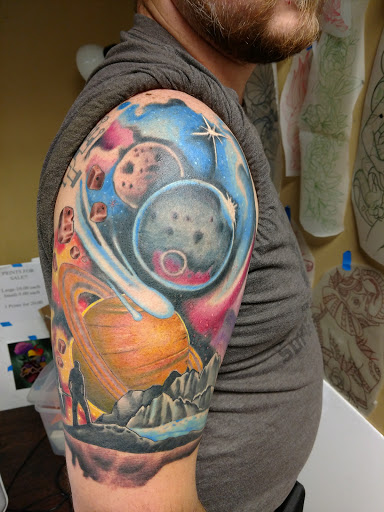 Explore santa tattoo ideas, creative tattoo ideas in Greensboro, available at Seven Sagas Tattoo Studio