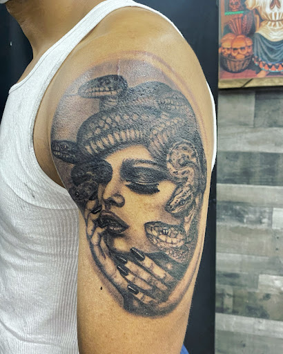 Explore barbell tattoo ideas, creative tattoo ideas in Anchorage, available at Unique Ink AK