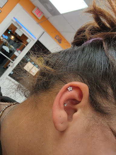 Explore tattoo ideas for a name cover up, creative tattoo ideas in Chesapeake, available at Im Just Saiyan Body Piercing