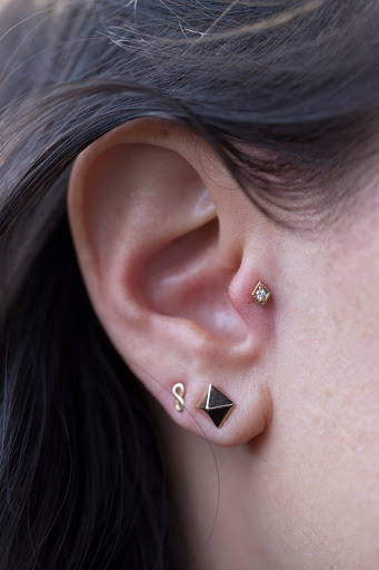 Explore one piece tattoo idea, creative tattoo ideas in Chicago, available at IRIS Piercing Studio and Jewelry Gallery