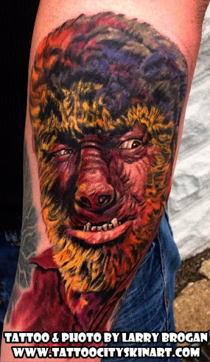 Find small wolf tattoo ideas for your next unique tattoo in Lockport at Tattoo City by Larry Brogan