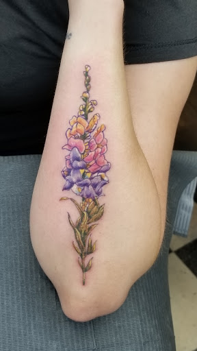 Explore back hand tattoo ideas, creative tattoo ideas in Bristol, available at Black Sparrow Tattoo Studio