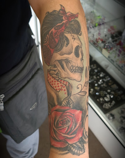 Explore floral tattoo cover up ideas, creative tattoo ideas in Garden Grove, available at Dr. Tattoo Studio