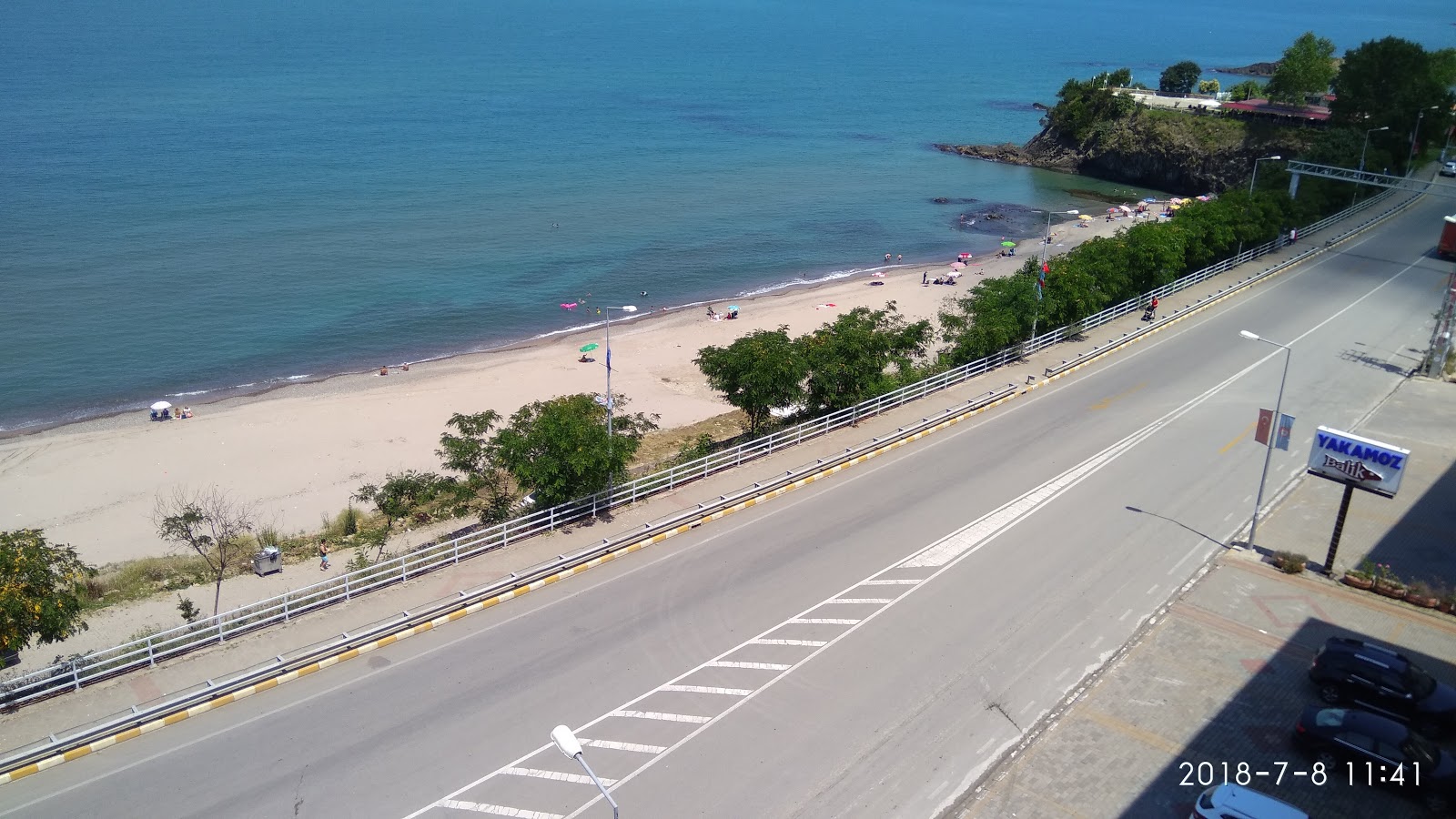 Fotografija Beygir Kumu Beach in naselje