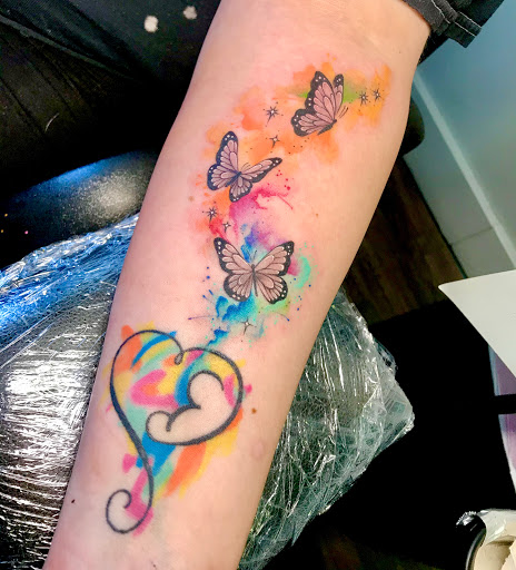 Explore tattoo of son's name ideas, creative tattoo ideas in Warrensburg, available at Altered Visions Tattoo Studio