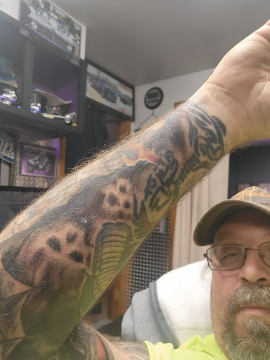 Explore name tattoo ideas on neck, creative tattoo ideas in Cicero, available at Skin Funk Tattoo