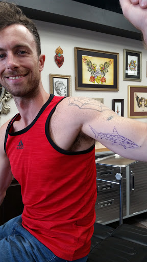 Explore to infinity and beyond tattoo ideas, creative tattoo ideas in Honolulu, available at Tattoolicious Tattoo Waikiki