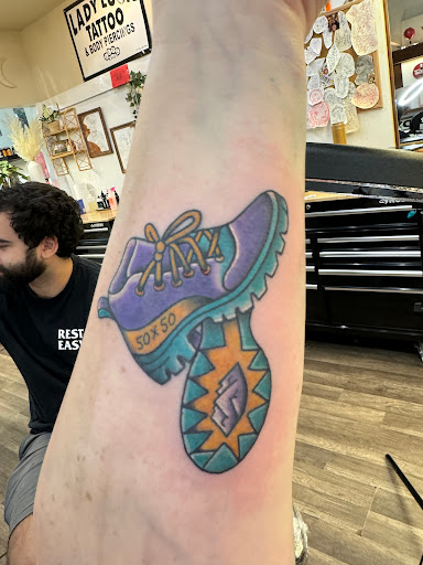 Explore solid black tattoo ideas, creative tattoo ideas in Kailua Kona, available at Lady Luck Tattoo & Body Piercing