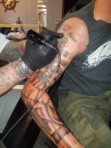 Explore blue jay tattoo ideas, creative tattoo ideas in Yorktown, available at Army Navy Tattoo