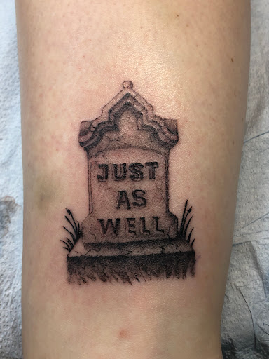 Explore cover up tattoo ideas for lower back, creative tattoo ideas in Everett, available at Sunken Ship Tattoos