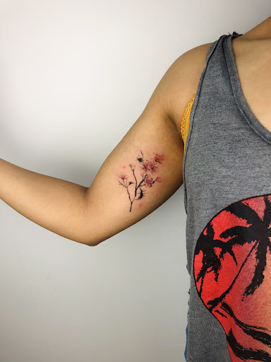 Explore black wolf tattoo ideas, creative tattoo ideas in Orange, available at Baron Art Tattoo