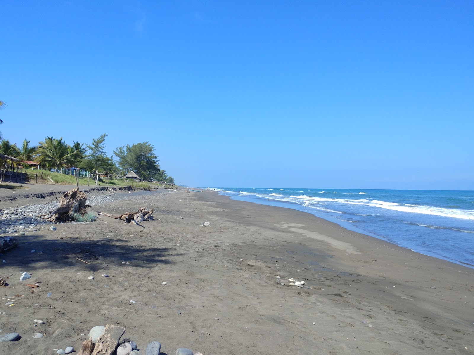 Photo de Playa Lechuguillas avec rivage droit, long