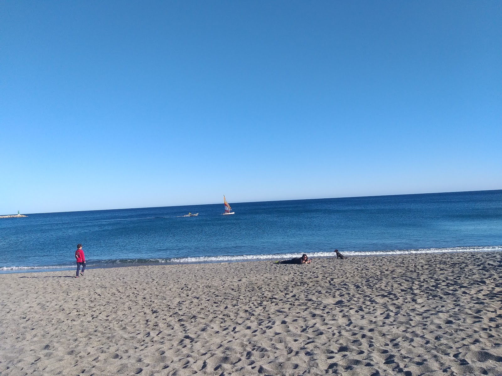 Fotografie cu Gigi's Beach și așezarea