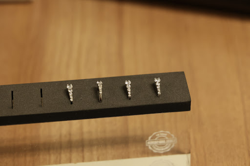 Explore flower tattoo sleeve ideas, creative tattoo ideas in Des Moines, available at Axiom Body Piercing Studio