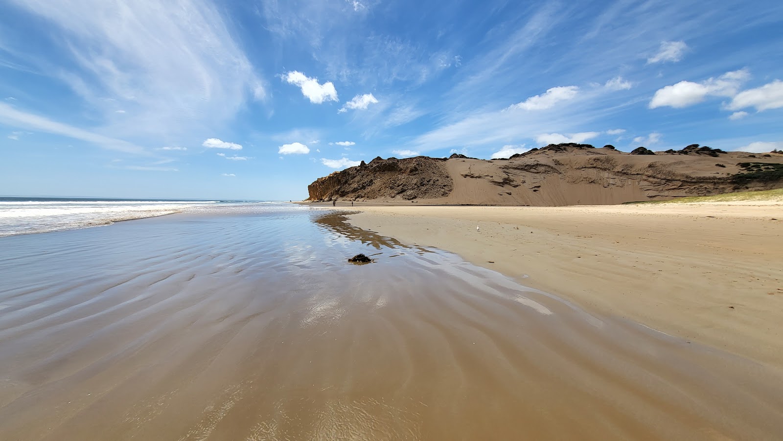 Foto av Darby Beach med turkos rent vatten yta