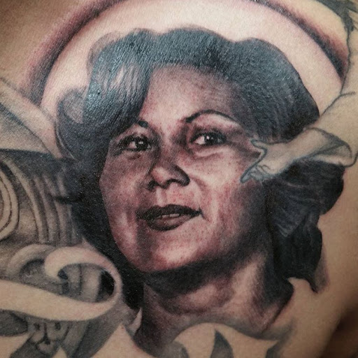 Explore afro samurai tattoo ideas, creative tattoo ideas in Oxnard, available at Downtown Tattoo & Body Piercing
