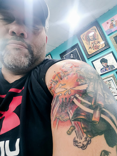 Tattoo Shop «Ink and Iron Tattoo Parlour and Gallery», reviews and photos, 1505 Adams St, Toledo, OH 43604, USA