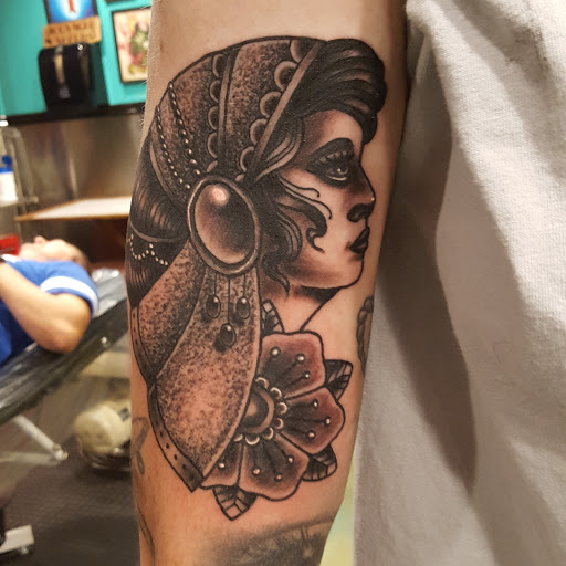 Find tattoos under the breast ideas for your next unique tattoo in Salt Lake City at Big Deluxe Tattoo