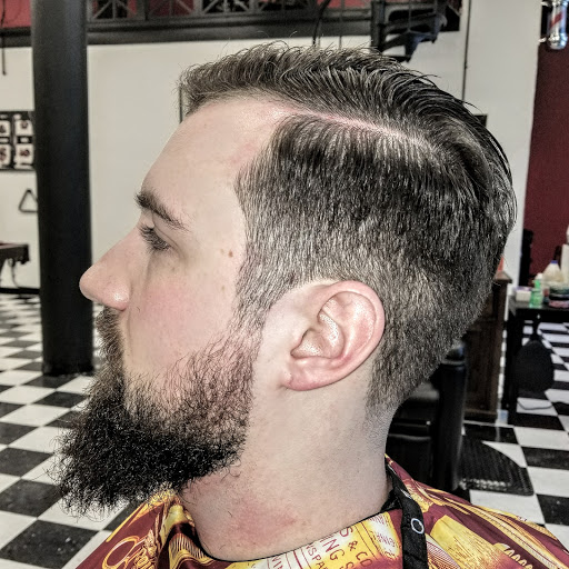 Explore tattoo ideas on back shoulder, creative tattoo ideas in Buffalo, available at The Salty Dog Barbershop