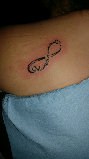 Explore c section tattoo ideas, creative tattoo ideas in Centre, available at Ink You Tattoos