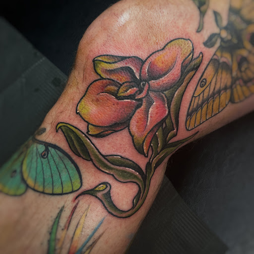 Find garter belt tattoo ideas for your next unique tattoo in Denton at Black Anchor Tattoo