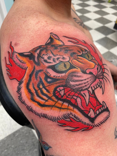 Explore full neck tattoo ideas for men, creative tattoo ideas in Virginia Beach, available at Salt Water Tattoo