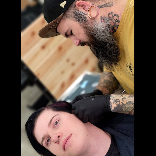 Explore tattoo cover up ideas for cross, creative tattoo ideas in Lees Summit, available at The Cherry Bomb Tattoo Co.