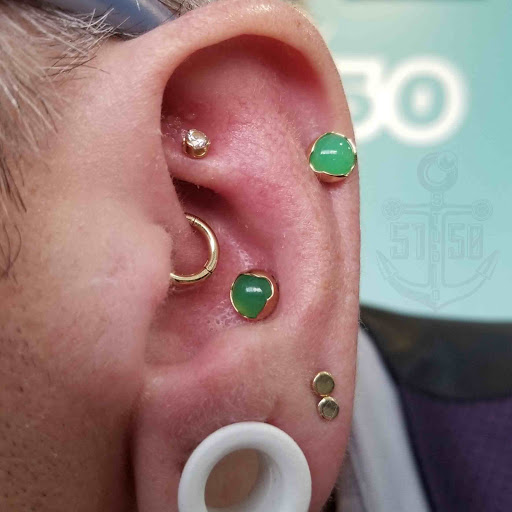 Find red indian tattoo ideas for your next unique tattoo in Kearney at Studio 5150 Piercing & Fine Jewelry