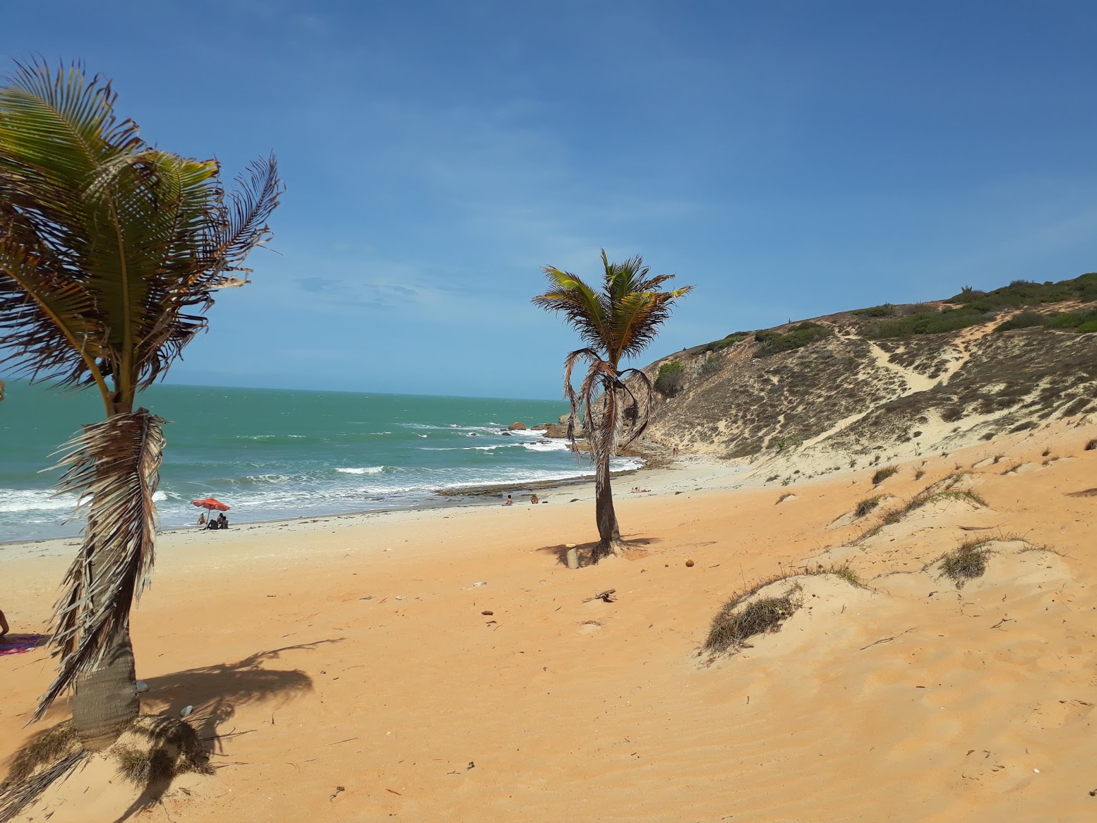 Zdjęcie Praia da Malhada z powierzchnią beżowy piasek